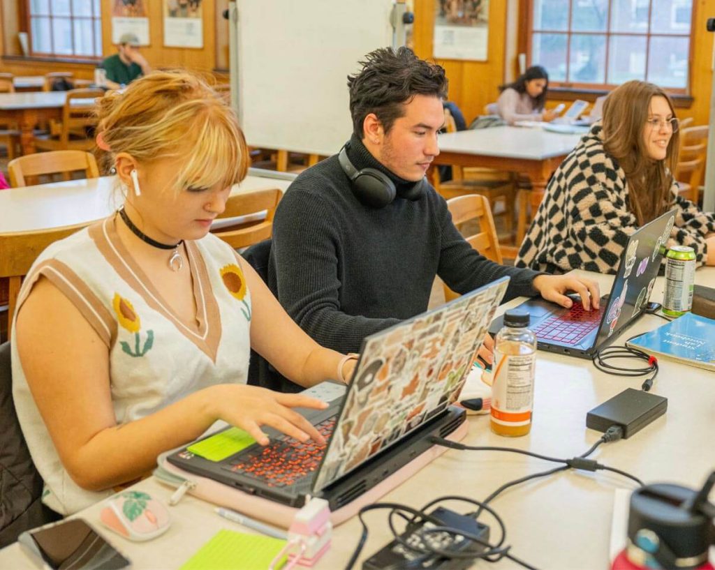 A photo of people studying in Fogler Library