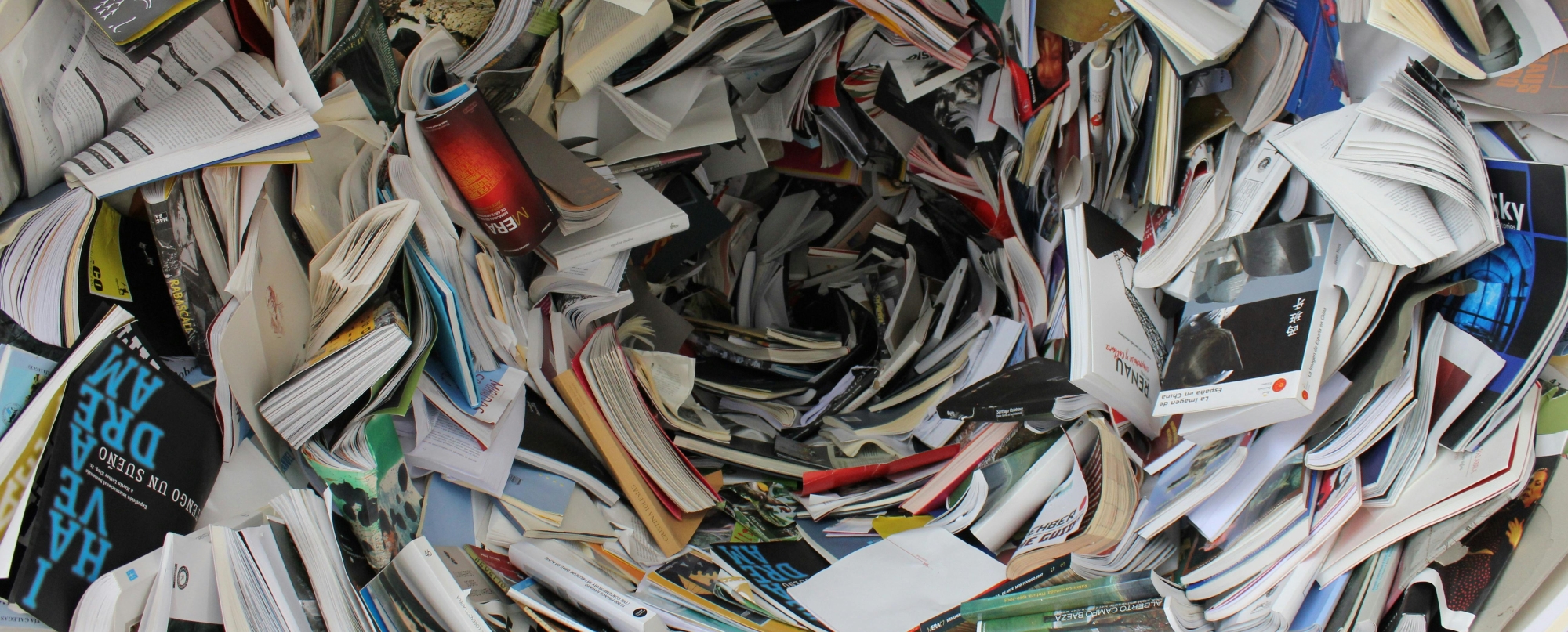 photo of books swirling down into a vortex